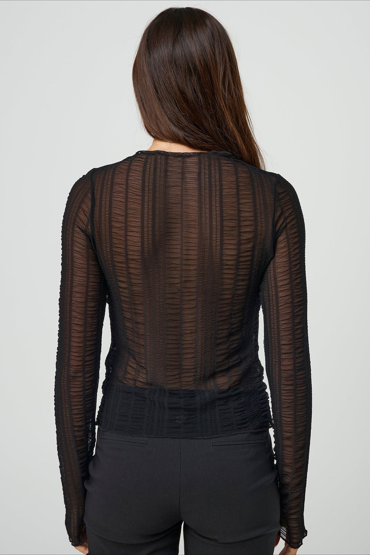 Chemise en maille transparente à manches longues pour femme