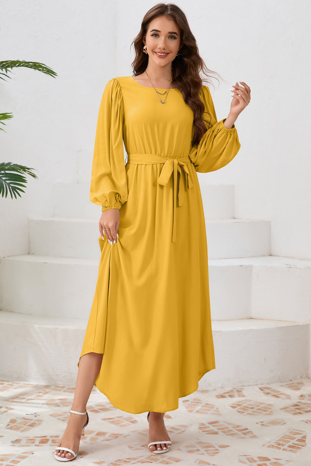 Robe longue élégante à manches longues avec ceinture nouée