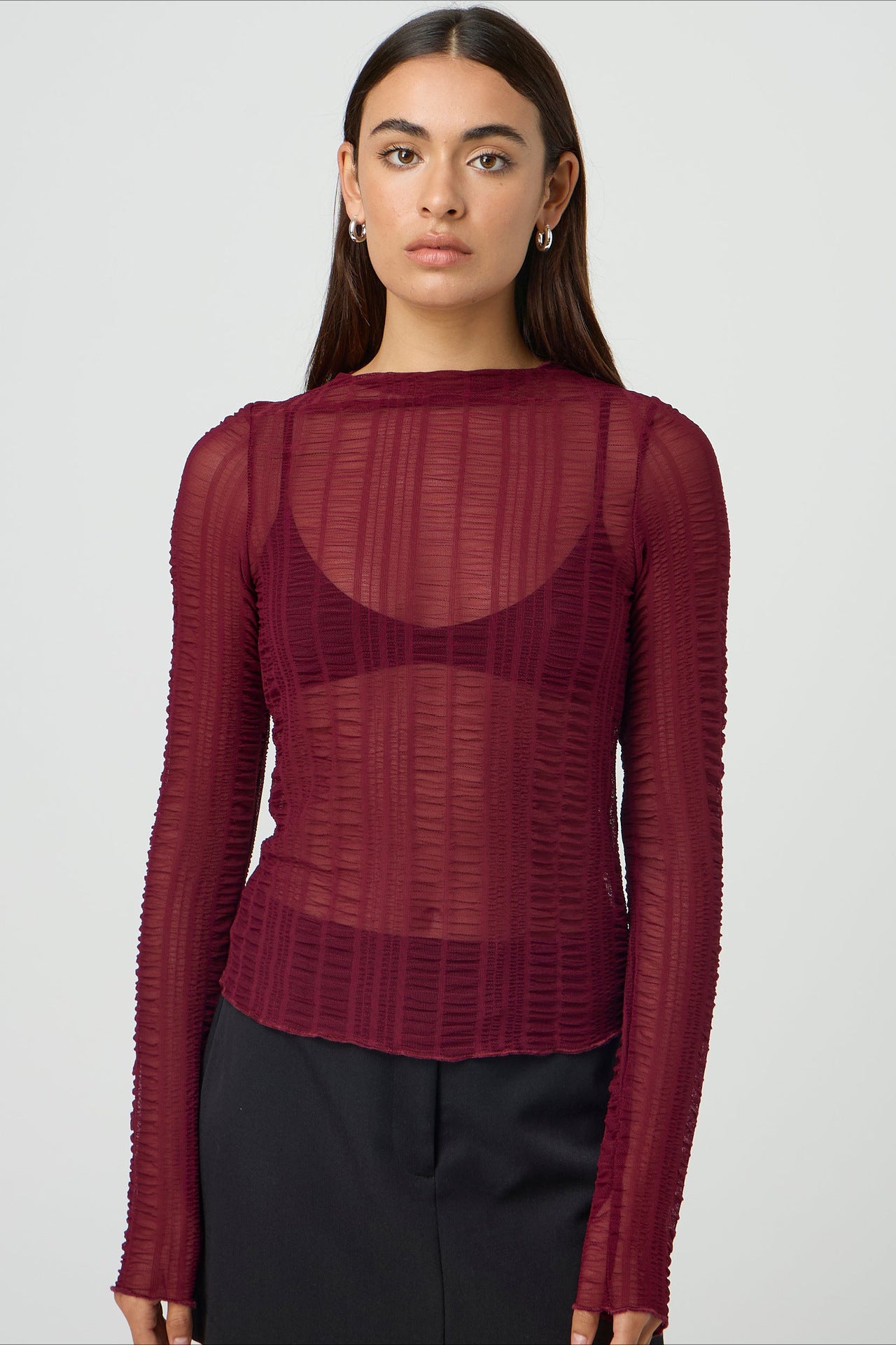 Chemise en maille transparente à manches longues pour femme