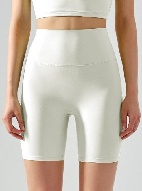 Short de yoga taille haute élastique sans couture de couleur unie 