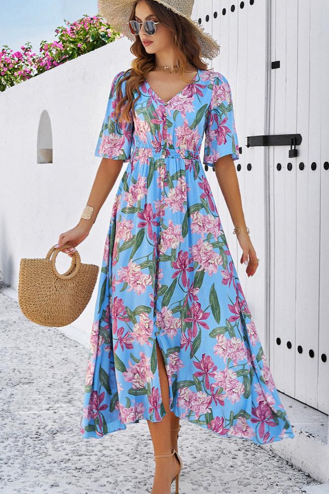 Robe mi-longue d'été chic à fleurs bleues avec col en V et fente latérale 