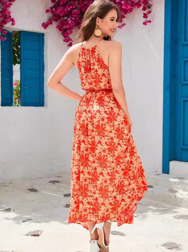 Robe tropicale orange sans manches à col licou