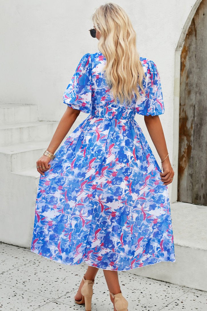 Robe mi-longue décontractée à fleurs et col en V à manches bouffantes