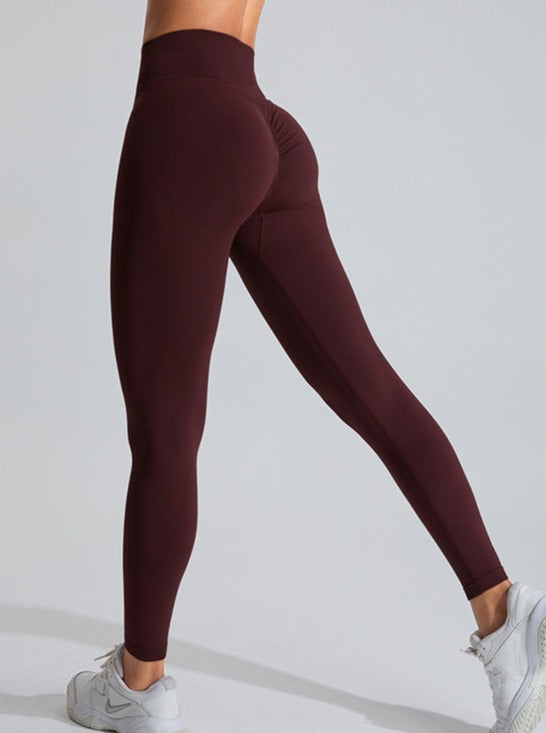 Pantalon de sport taille haute rouge foncé rehaussant le ventre 