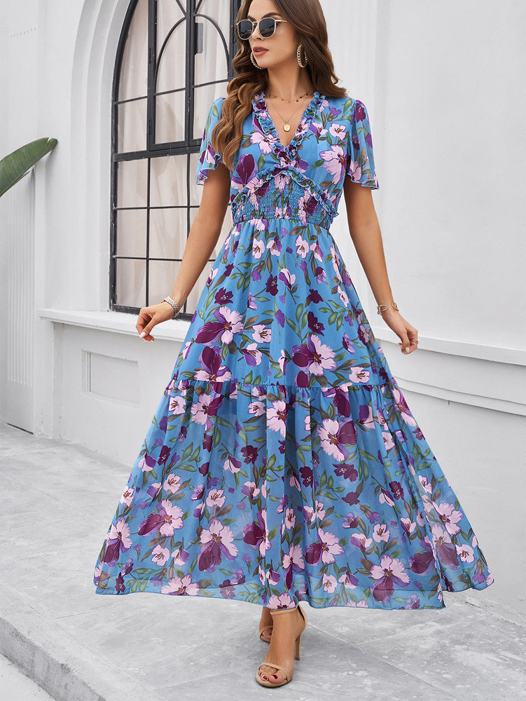 Robe d'été bleue à imprimé floral et col en V 