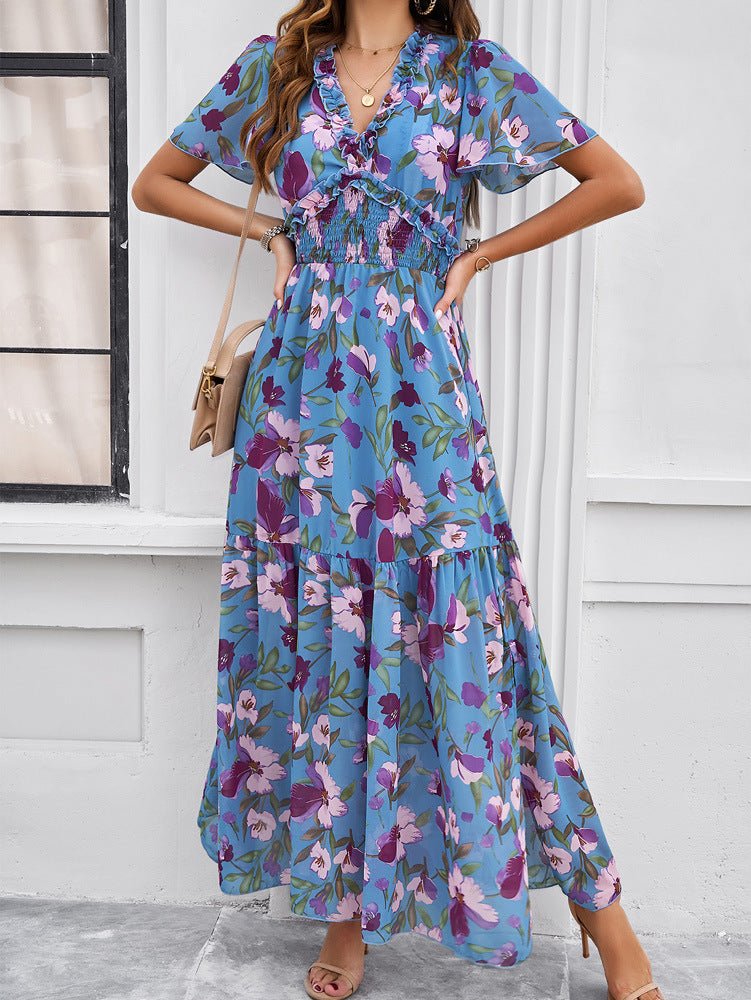 Robe d'été bleue à imprimé floral et col en V 