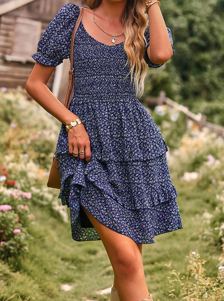 Robe jupe à imprimé floral bleu à col en V et épaules dénudées