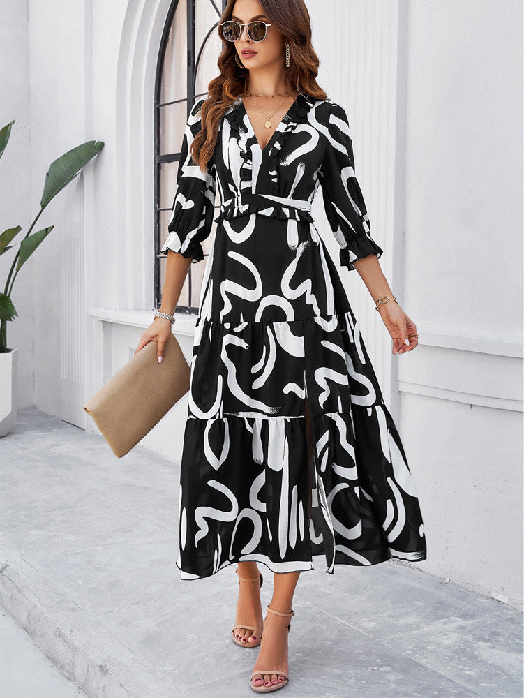 Robe d'été noire à imprimé abstrait et col en V 