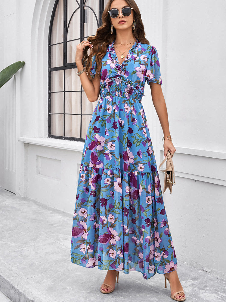 Robe d'été bleue à imprimé floral et col en V 