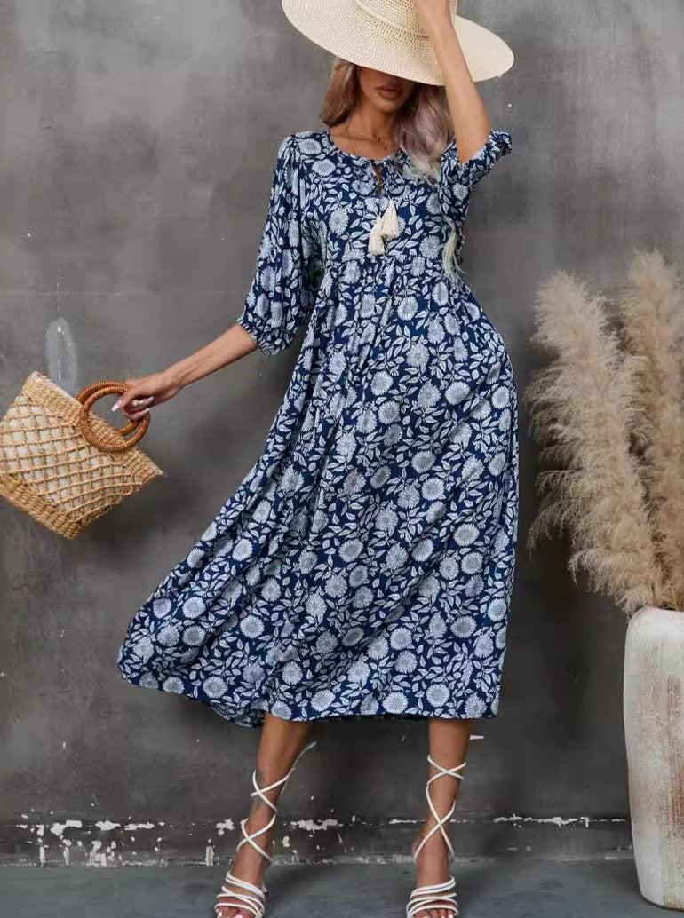 Robe bohème bleue à manches mi-longues et col en V