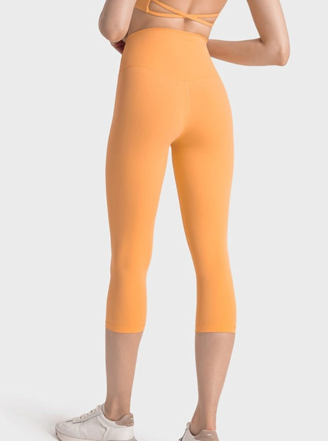 Pantalon de yoga extensible taille haute orange pour exercices