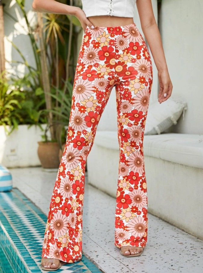 Pantalon évasé moulant à imprimé floral 