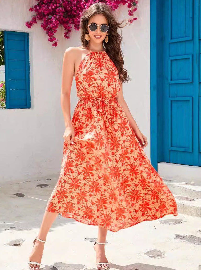 Robe tropicale orange sans manches à col licou