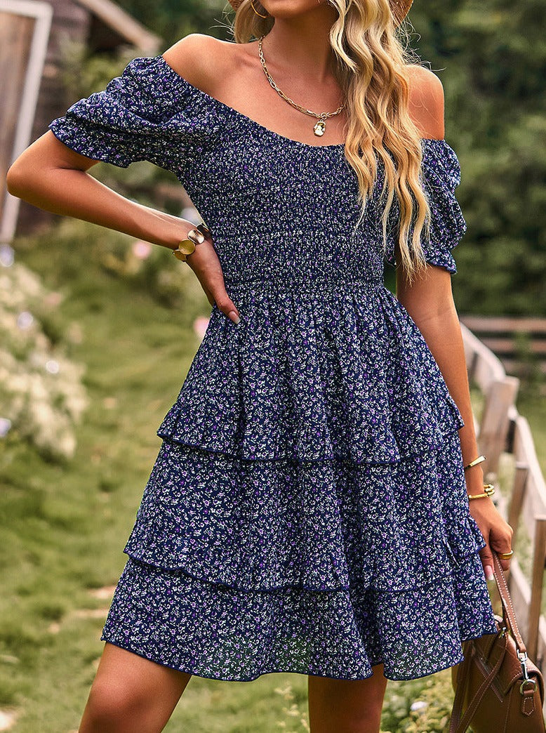 Robe jupe à imprimé floral bleu à col en V et épaules dénudées