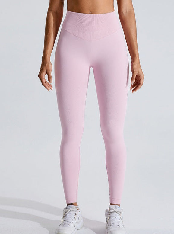 Pantalon de sport taille haute de couleur unie rehaussant le ventre 