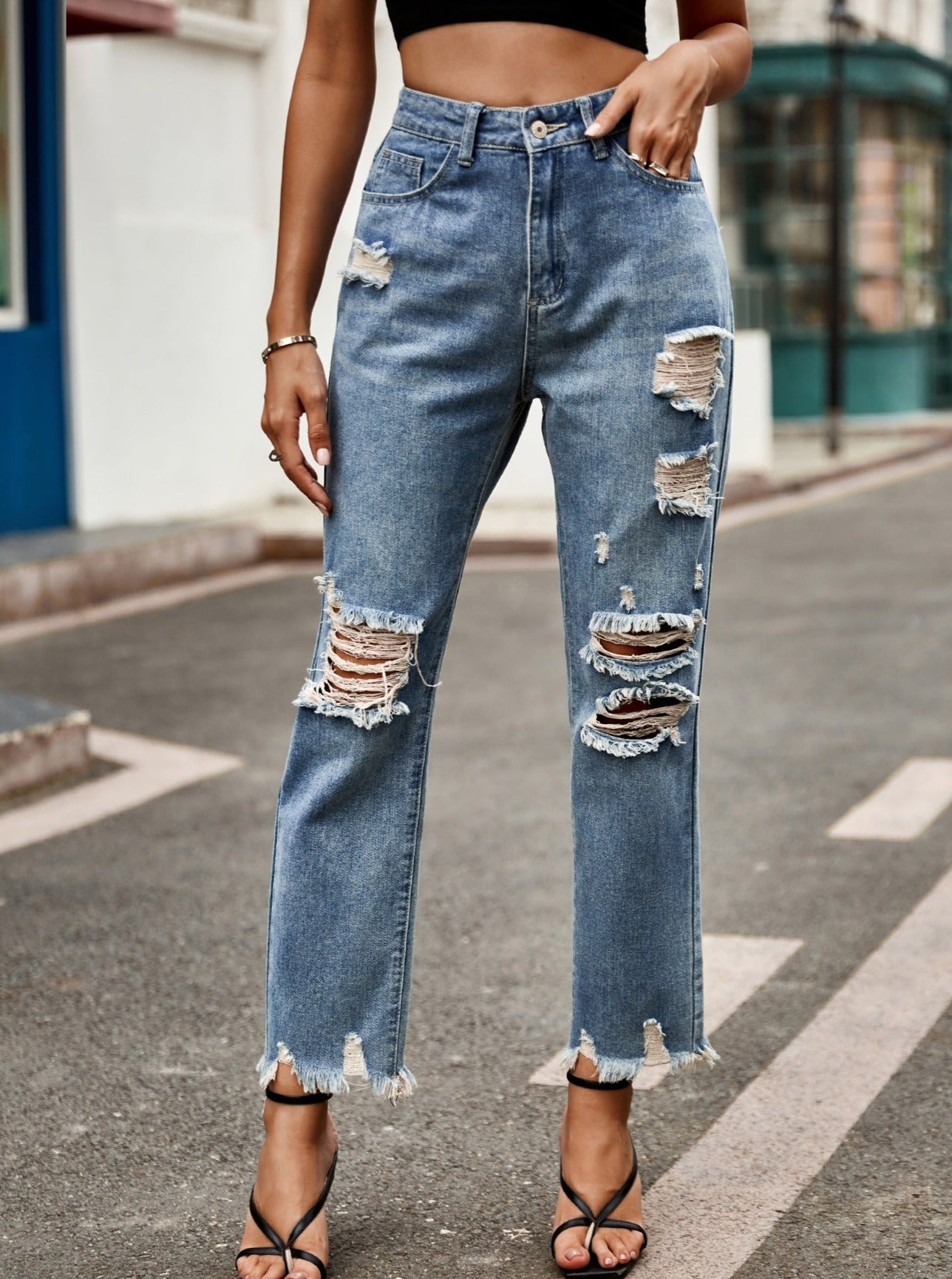 Jean évasé taille haute boutonné et déchiré en denim