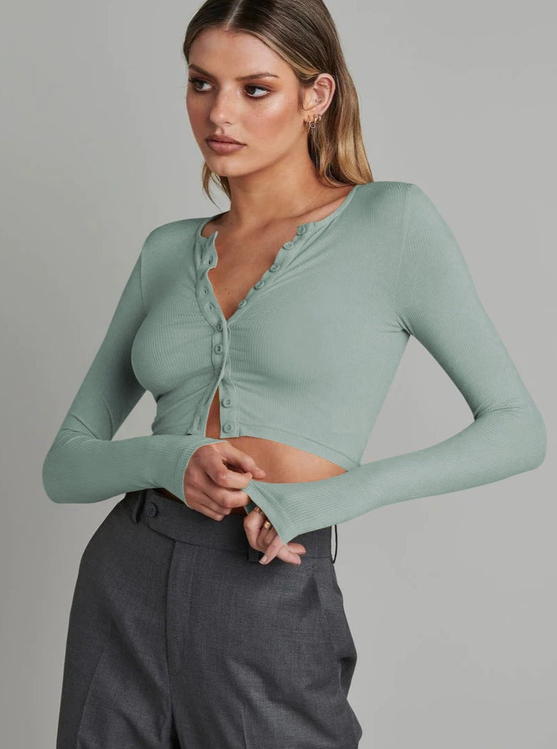 Cardigan tricoté à manches longues et boutons vert foncé 