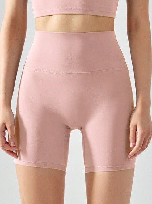 Short de yoga taille haute élastique sans couture de couleur unie 