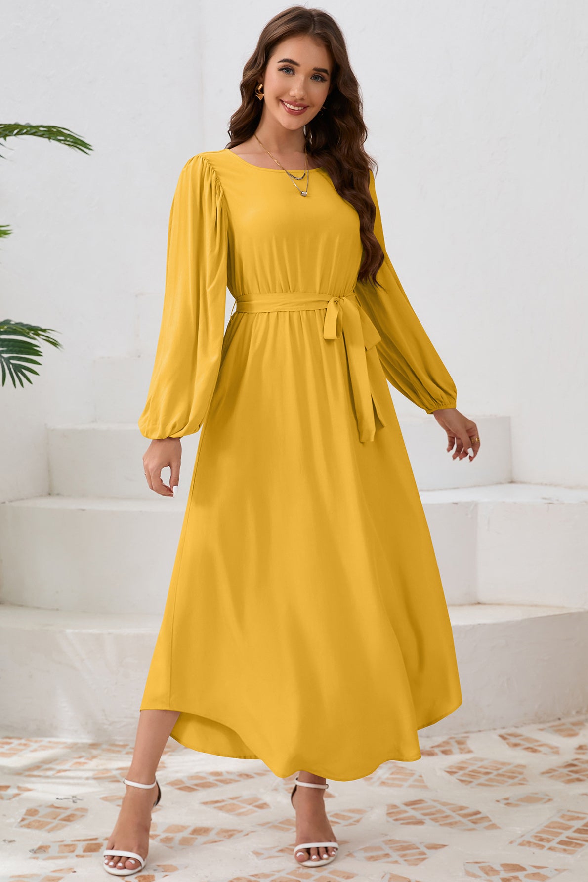 Robe longue élégante à manches longues avec ceinture nouée